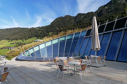 modern sitting area with mountains in background